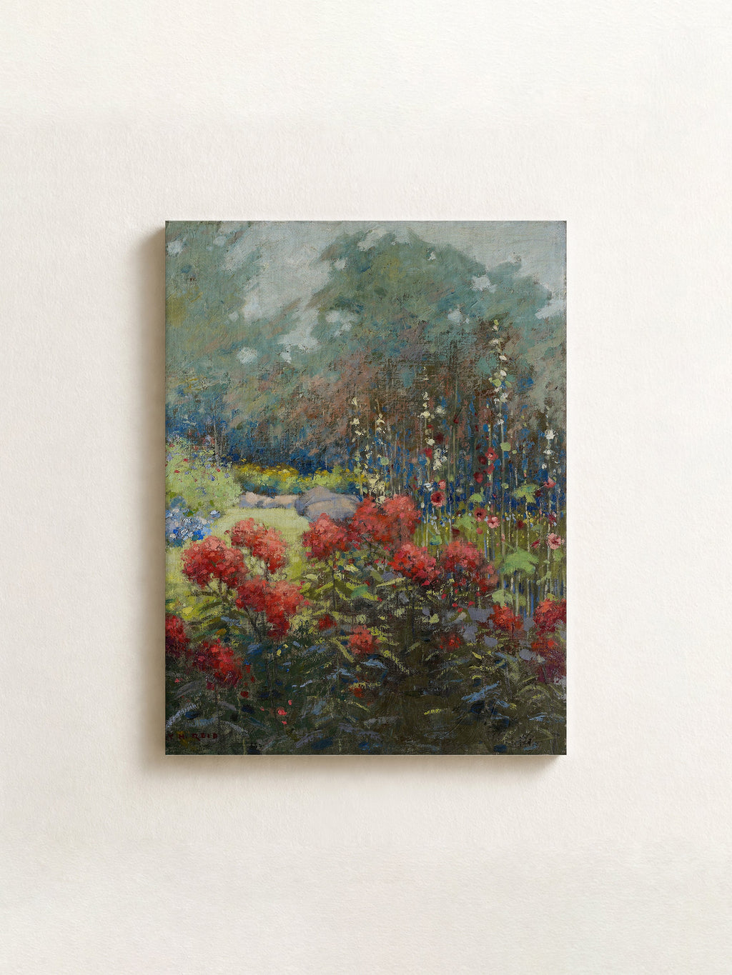 An impressionist-style floral painting on canvas, featuring prominent red flowers, green foliage, and soft blue-green background tones, displayed against a light beige wall.
