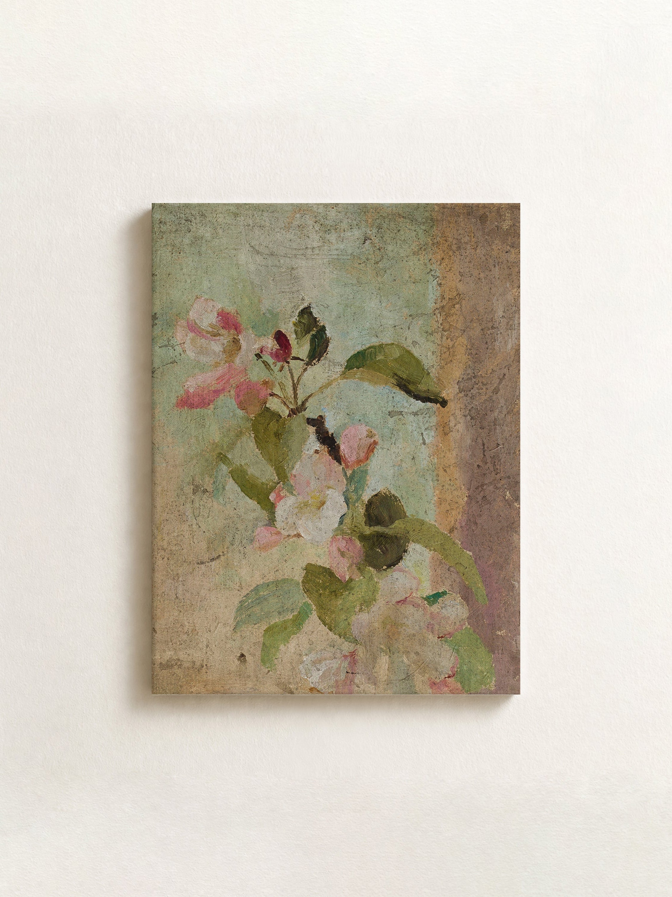 A rectangular canvas wall art print featuring a vintage-style painting of pink blossoms and green leaves on a textured beige and muted blue background, displayed against a light off-white wall.