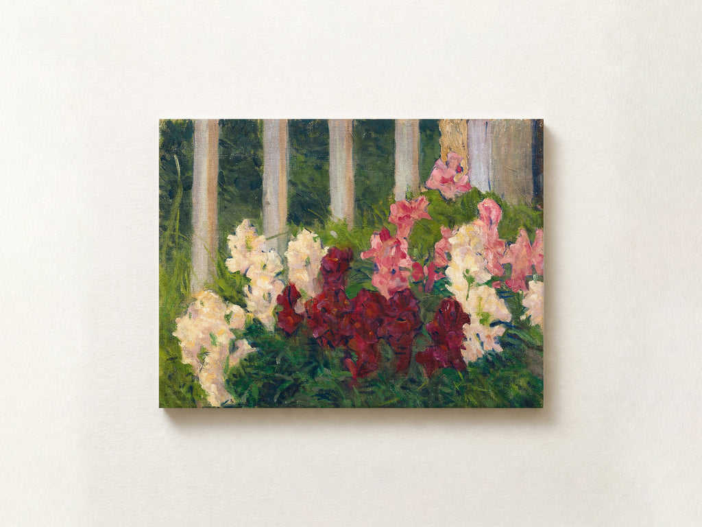 A horizontal canvas painting of a forest meadow with white, pink, and burgundy flowers in front of tree trunks, displayed on a light beige wall.