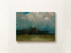 An oil landscape painting of a stormy sky over a tree line and field, displayed on a textured off-white wall.