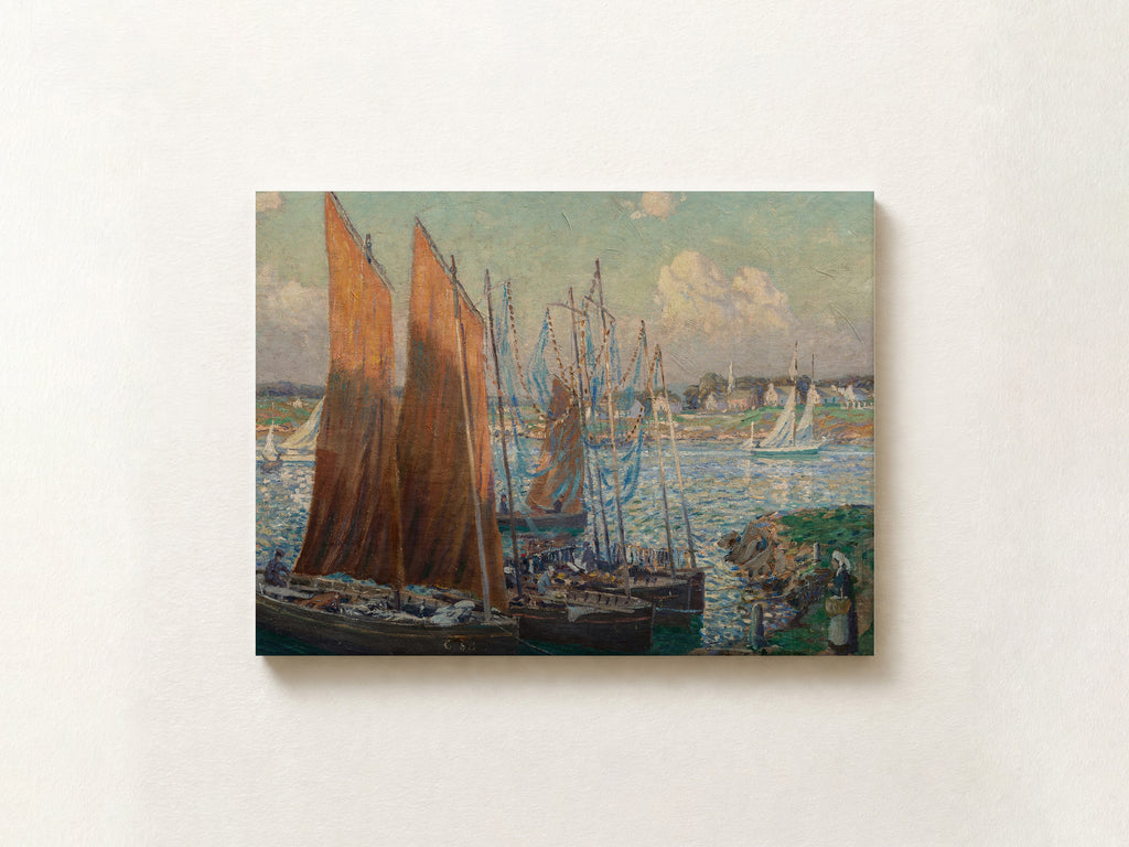 A horizontal canvas print of an impressionist painting depicting sailboats on a harbor, mounted on a textured off-white wall.