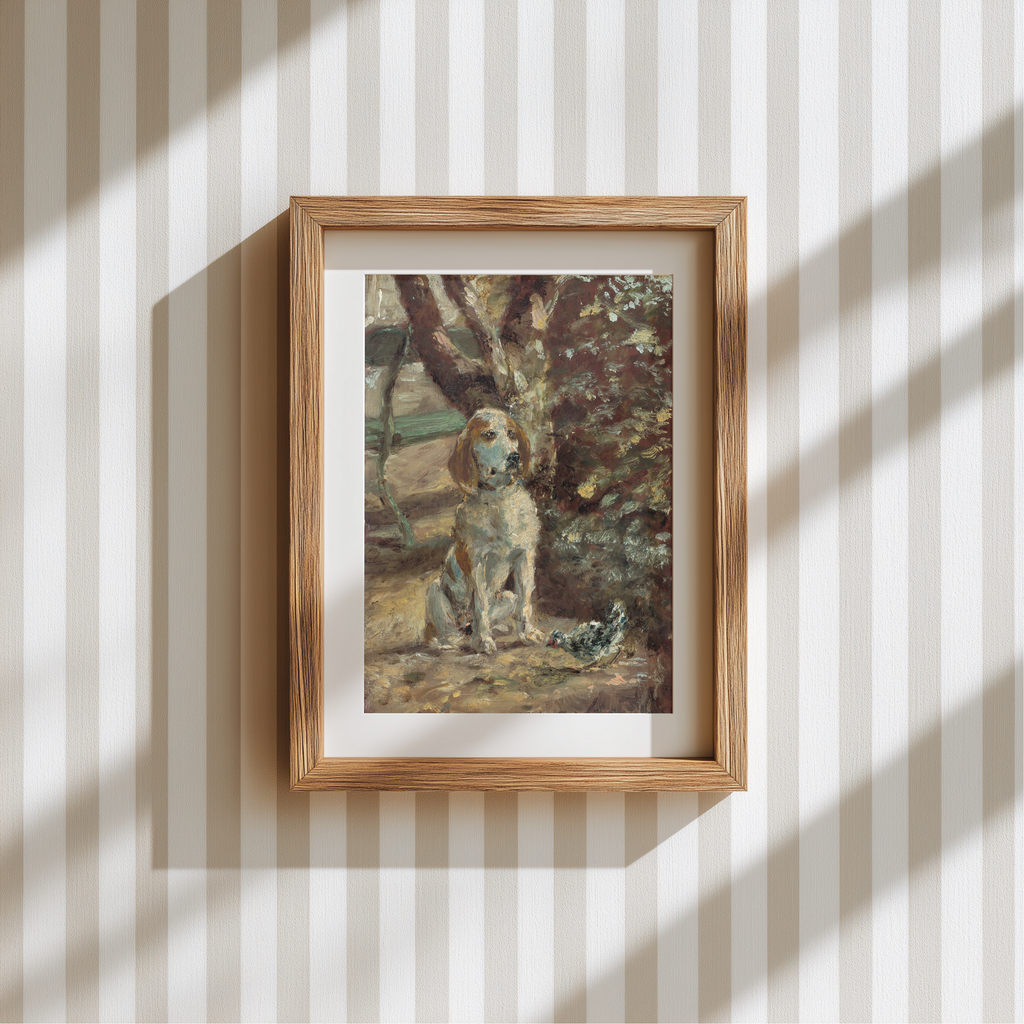 A framed art print depicting an impressionist-style painting of a white and brown dog sitting in a garden, mounted on a beige and white vertically striped wallpaper background with soft window shadow patterns.