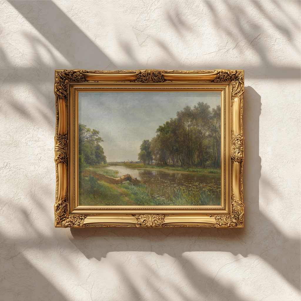 An ornate gold-framed landscape painting hangs on a textured off-white wall, with soft shadows cast across the scene.